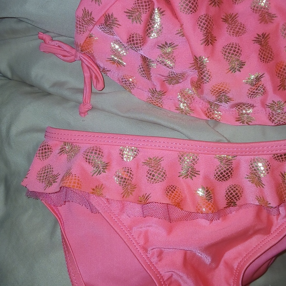 Coral Pink Girls' Ruffled One-Piece Swimsuit with Gold Pineapples